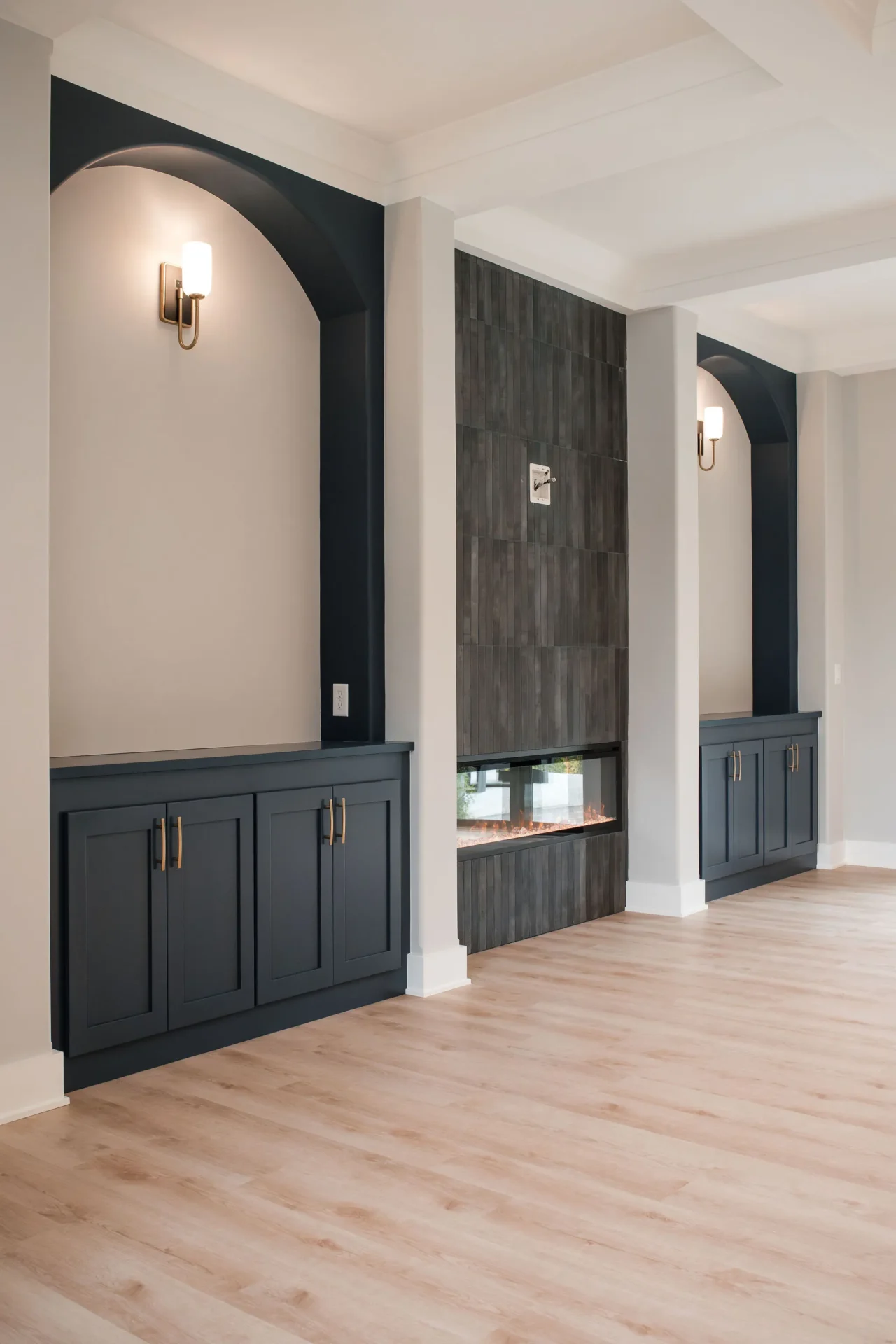 Professional painter assisting homeowner with color selection using paint swatches